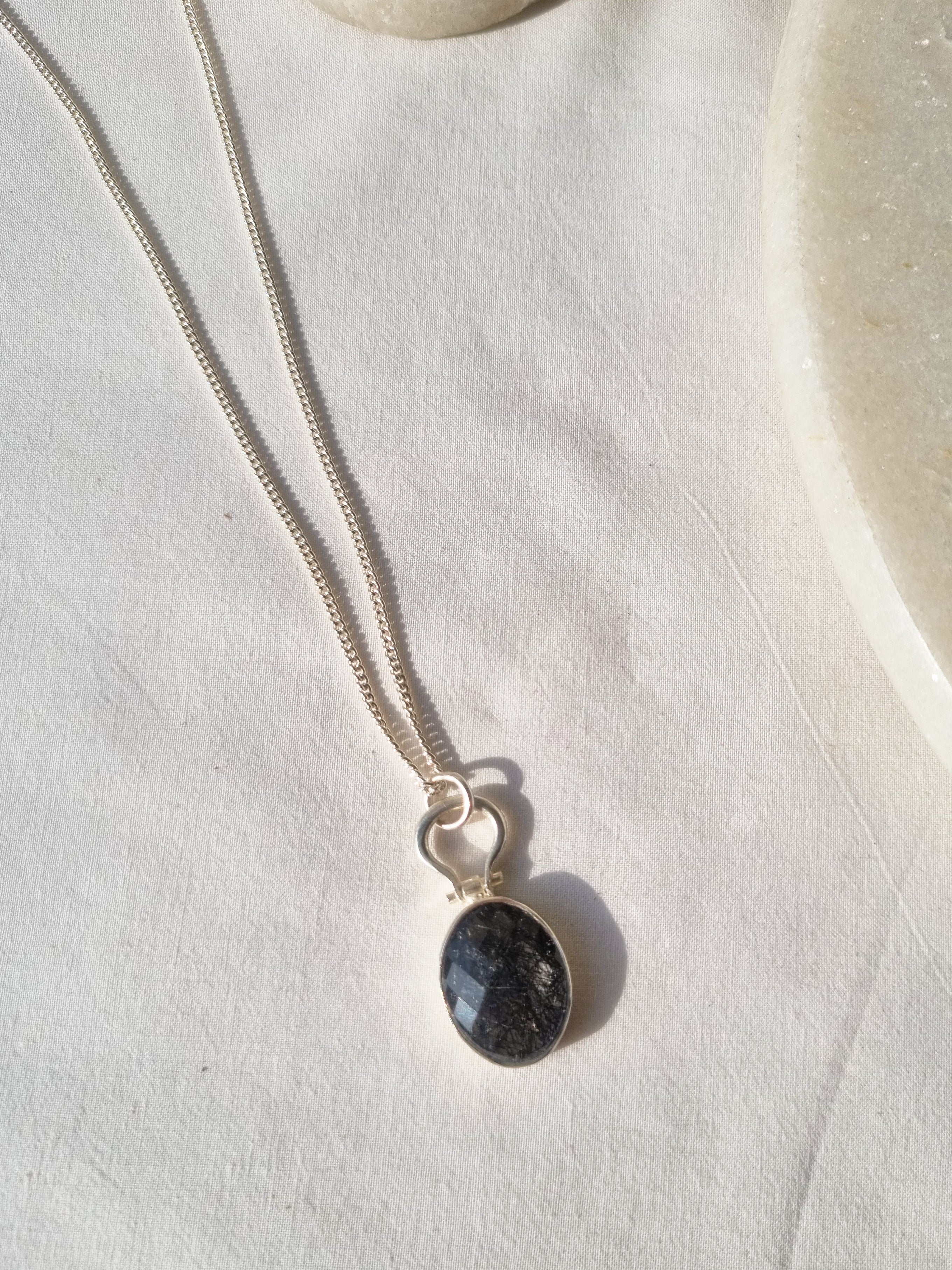 kirata - Black Rutilated Quartz Oval Keyhole Pendant