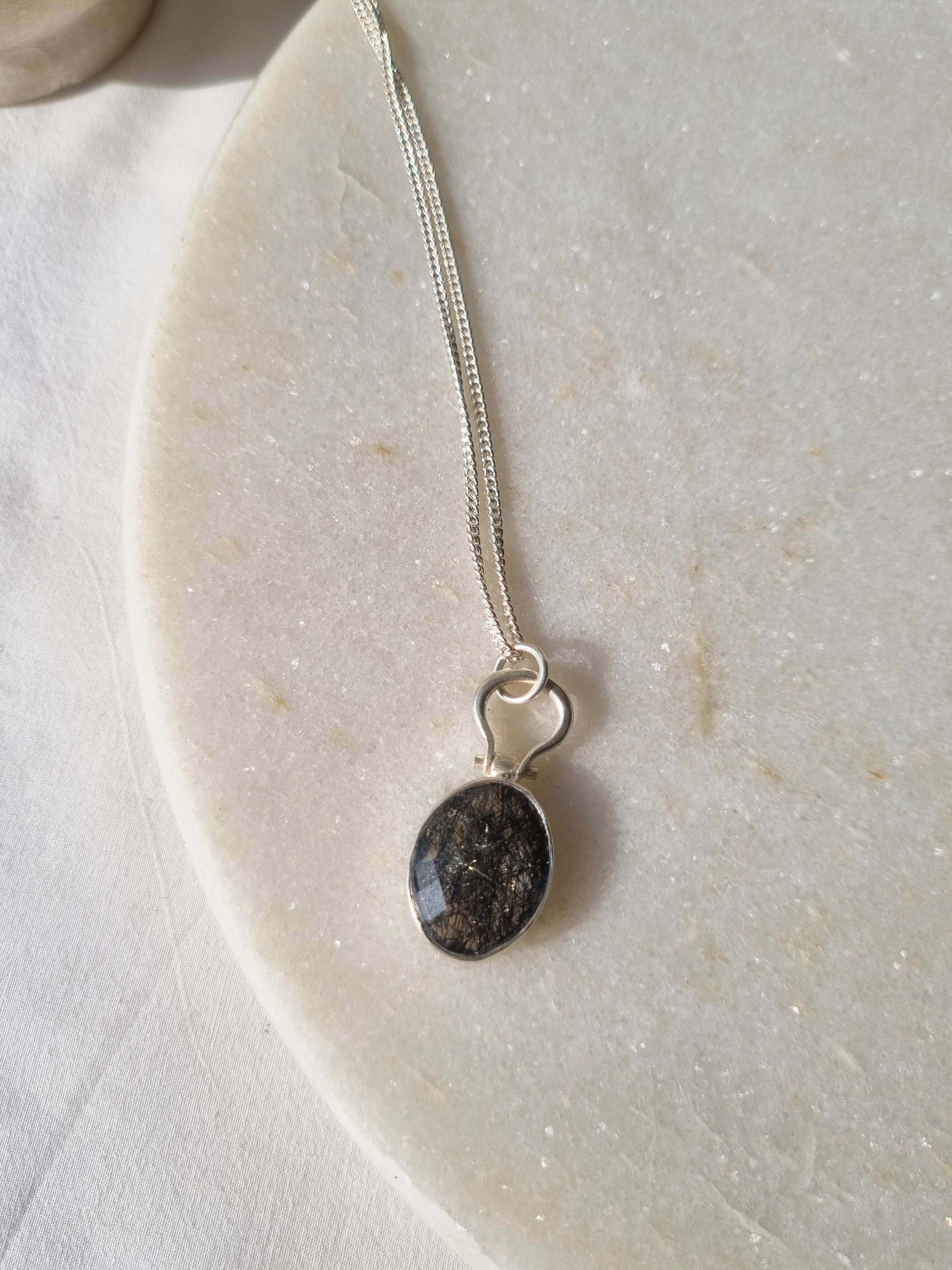 kirata - Black Rutilated Quartz Oval Keyhole Pendant