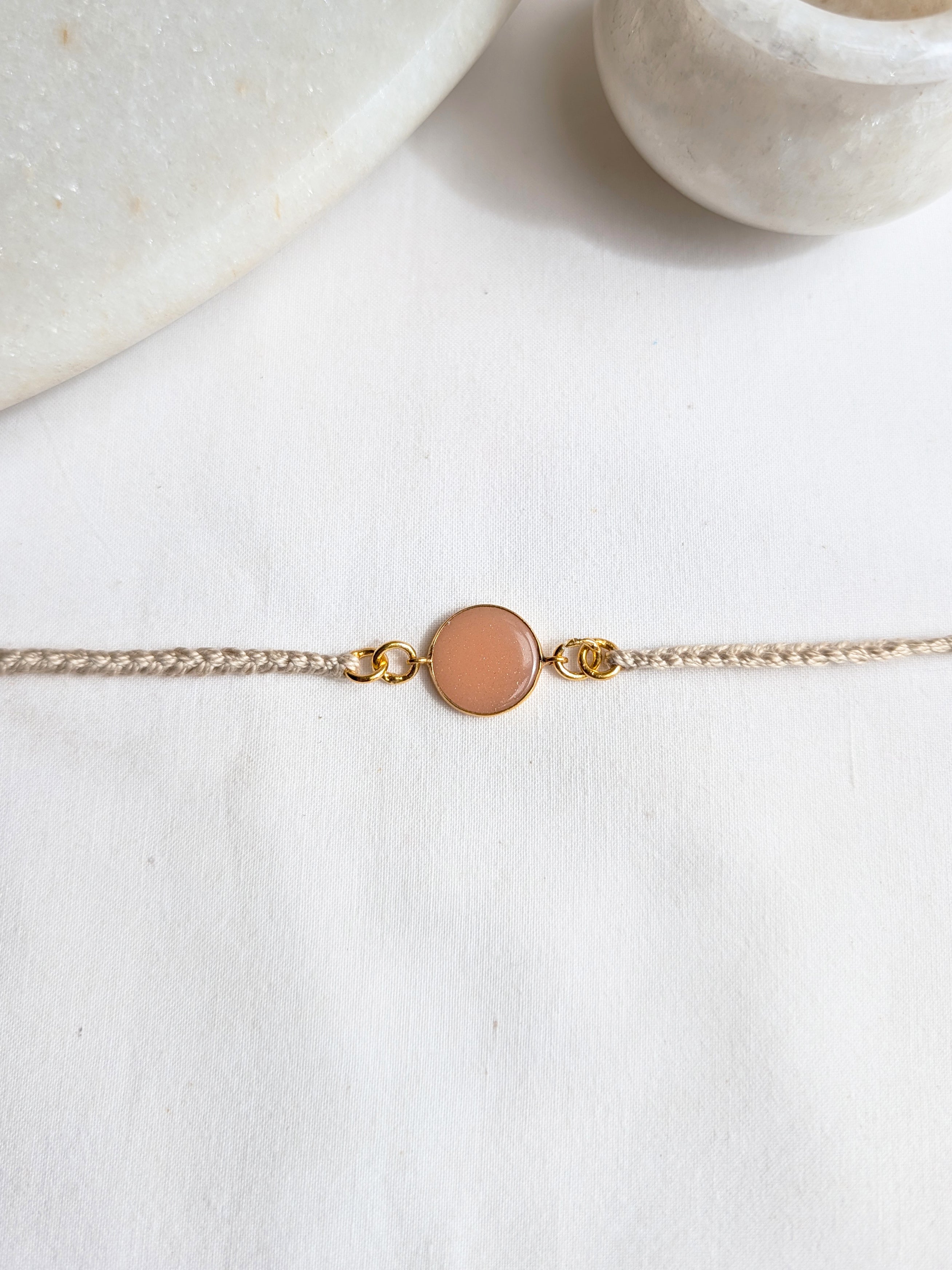 matsya - Peach Moonstone Round Charm Rakhi