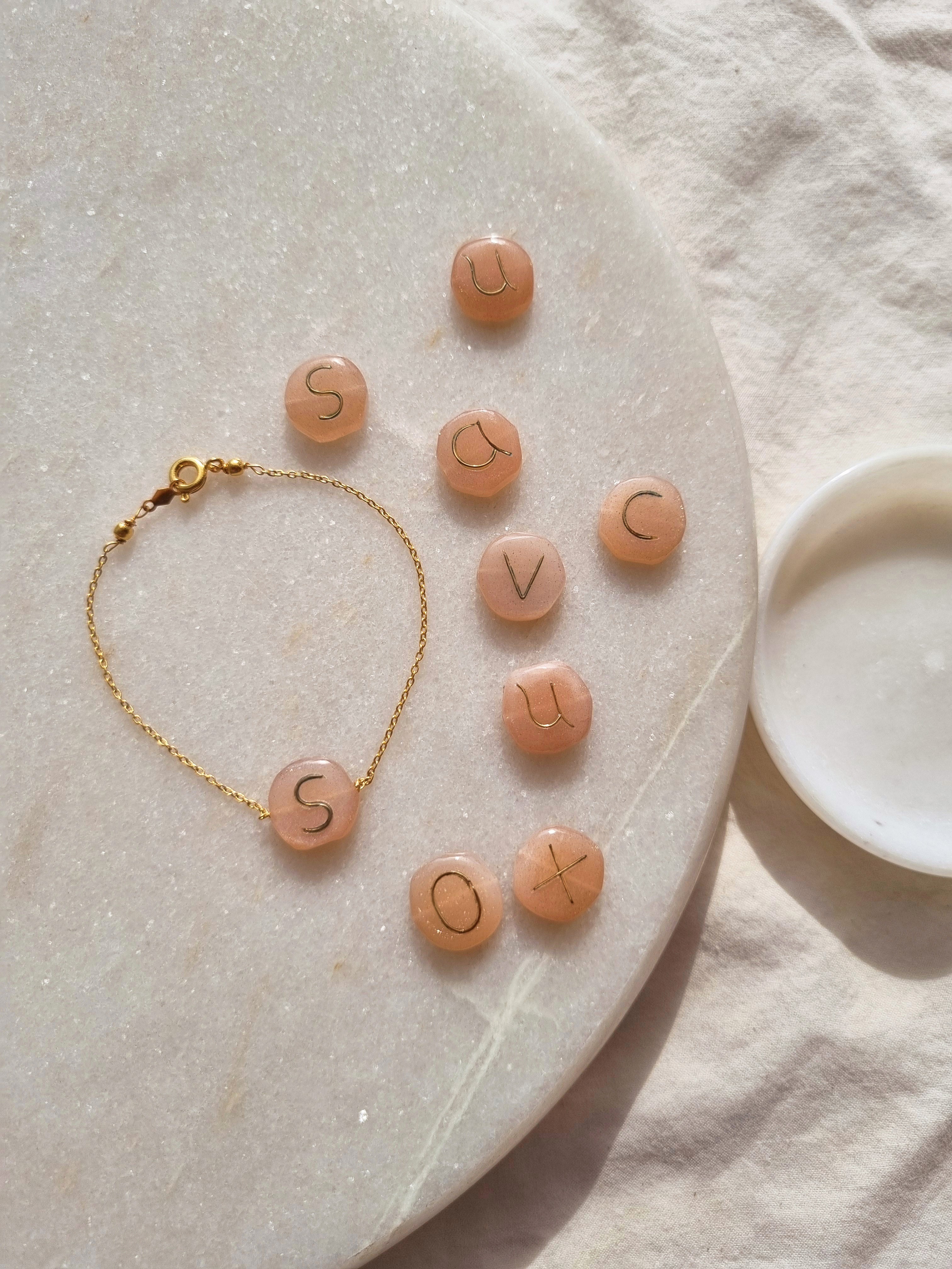 medaya - Peach Moonstone Pebble with Embossed Initial Bracelet