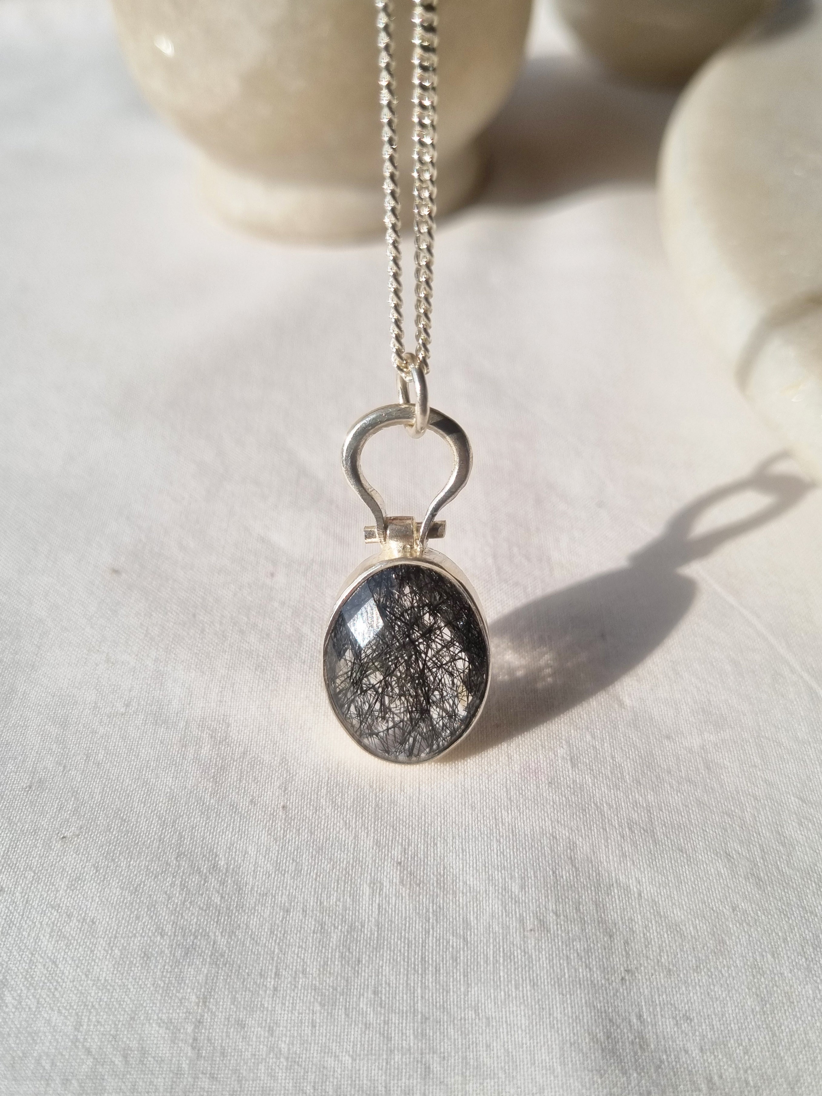 kirata - Black Rutilated Quartz Oval Keyhole Pendant