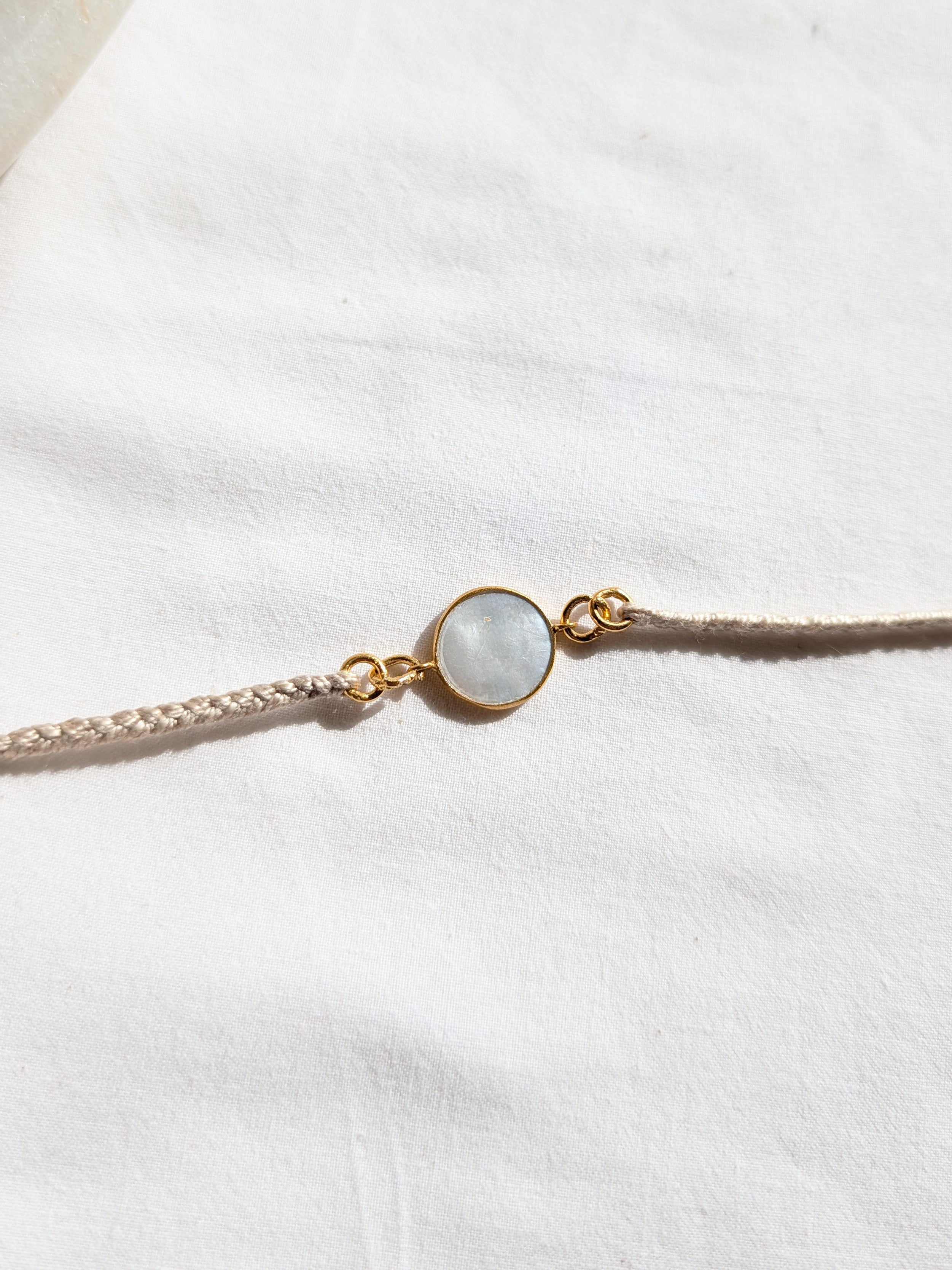 matsya - Mother of Pearl Round Charm Rakhi