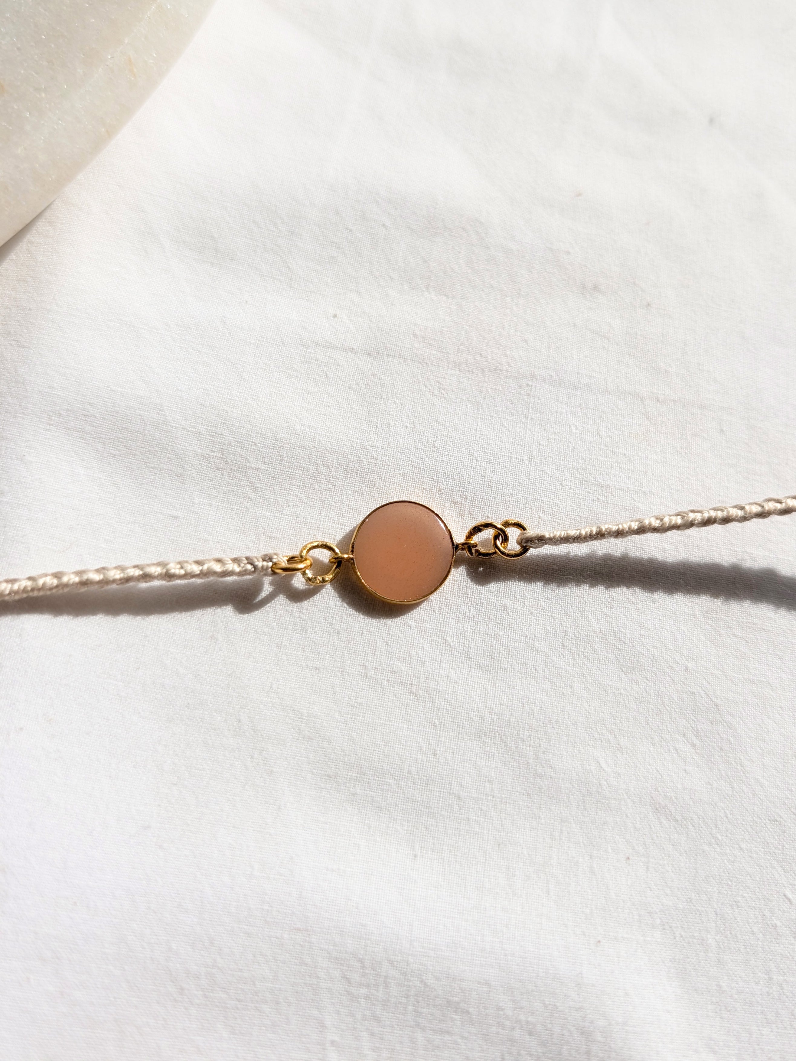 matsya - Peach Moonstone Round Charm Rakhi